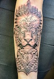Löwenkopf Tattoo im  Mandala-Style.
