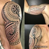 Polynesisches Maori Tattoo auf dem Obermarm.